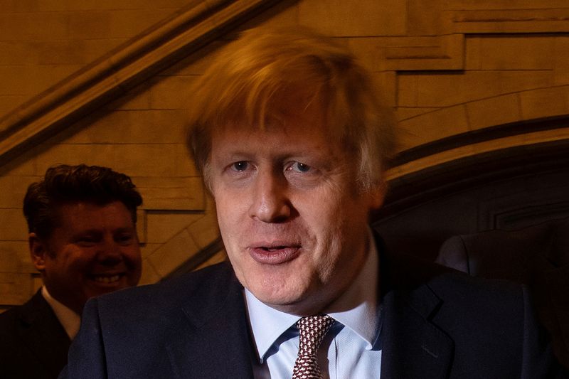 © Reuters. British Prime Minister Boris Johnson greets newly-elected Conservative MPs at the Houses of Parliament, London