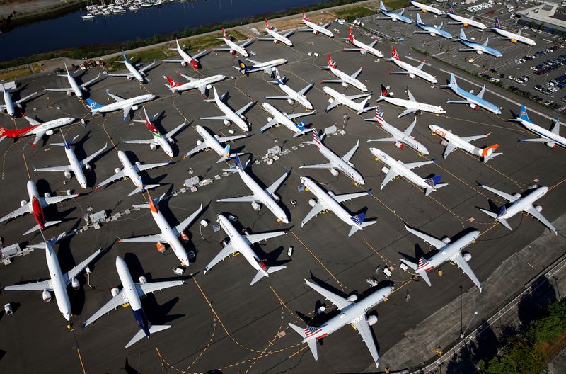 © Reuters. FILE PHOTO: FILE PHOTO: Dozens of grounded Boeing 737 MAX aircraft are seen parked at Boeing Field in Seattle