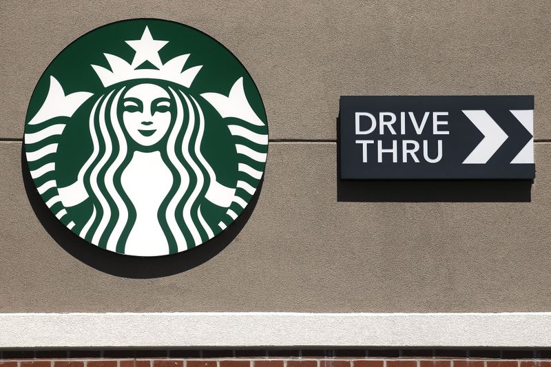© Reuters. A Starbucks Drive Thru logo is pictured on a building in Buffalo, New York