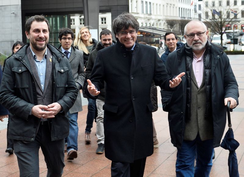 EU lower court must reexamine Puigdemont and Comin's bid to take up seats as EU lawmakers