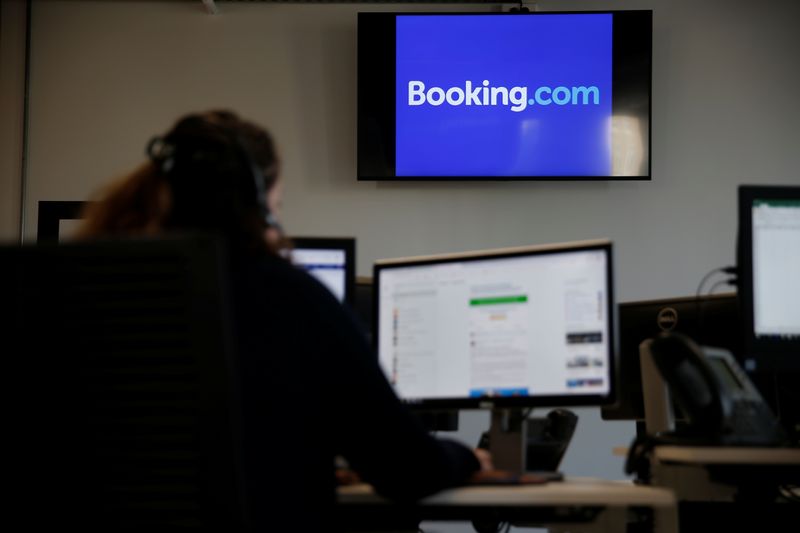 © Reuters. An employee works on his computer at the new Booking.com customers site in Tourcoing