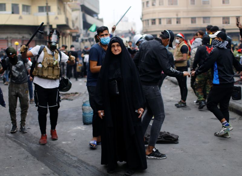 © Reuters. Wider Image: Portraits from the frontlines of global protests