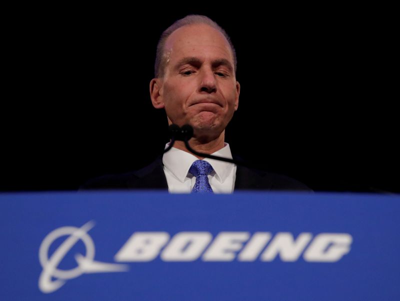 © Reuters. FILE PHOTO: Boeing CEO Muilenburg pauses while speaking during a news conference at the annual shareholder meeting in Chicago