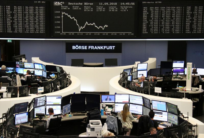 Festive world markets pause for breath near record highs