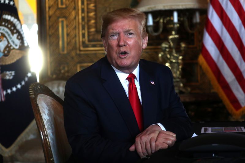 © Reuters. U.S. President Donald Trump participates in a video teleconference with members of the U.S. military at Trump's Mar-a-Lago resort in Palm Beach