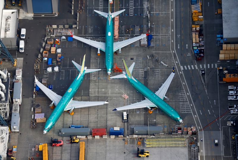 © Reuters. An aerial photo shows Boeing 737 MAX airplanes parked on the tarmac at the Boeing Factory in Renton