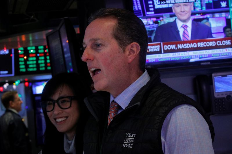 S&amp;P 500, Dow eke out records; Nasdaq win streak ends