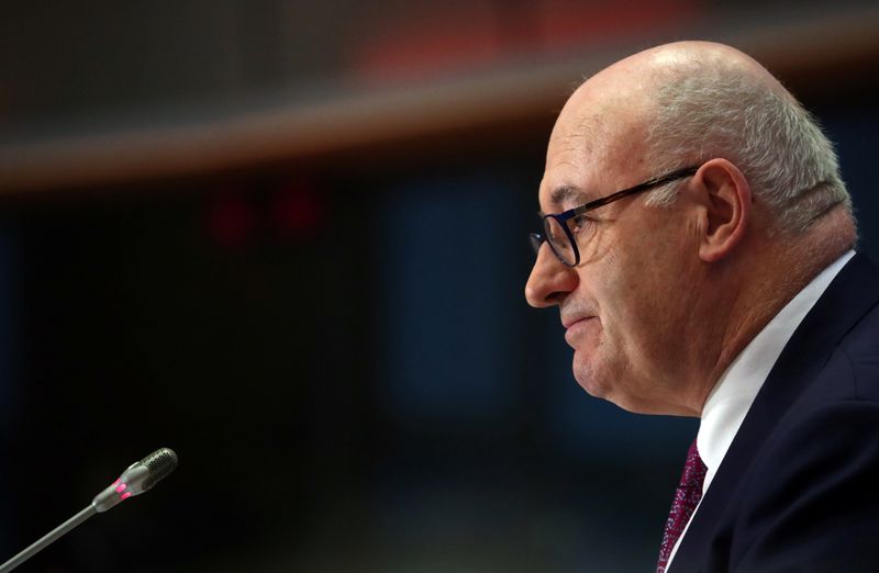 © Reuters. FILE PHOTO: European Trade Commissioner-designate Phil Hogan attends his hearing before the European Parliament in Brussels