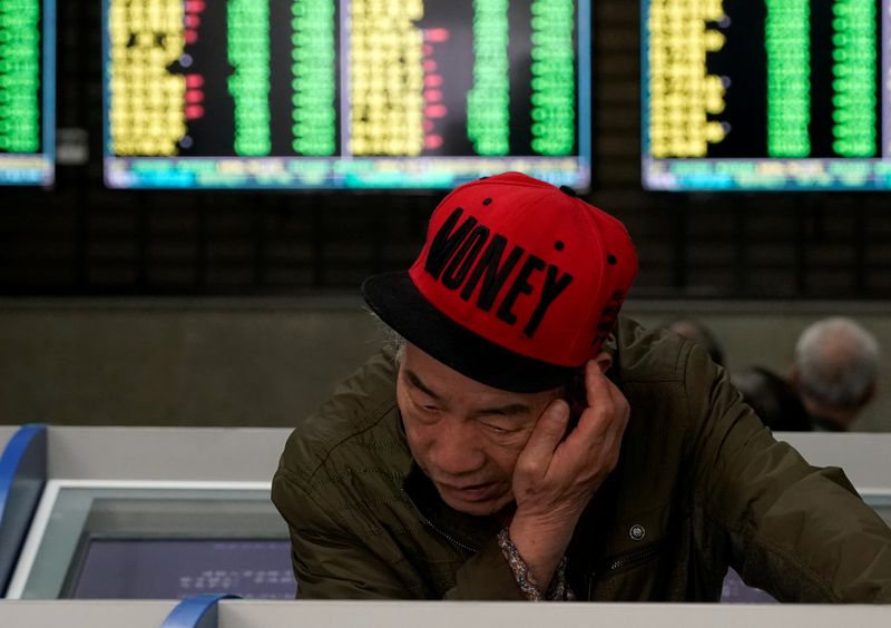 © Reuters. FILE PHOTO: FILE PHOTO: A sign of OVO payment is seen at a mall in Jakarta