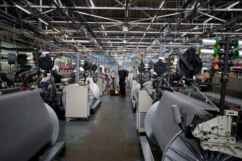 © Reuters. FILE PHOTO: A general view of the factory floor at Camira Fabrics in Huddersfield