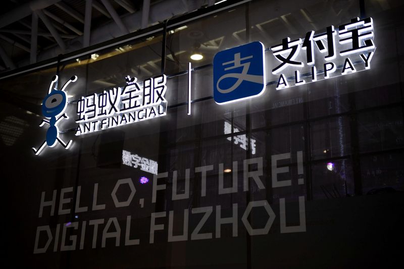 © Reuters. Logo of Ant Financial Services Group is seen next to a logo of Alipay at the Digital China exhibition in Fuzhou, Fujian