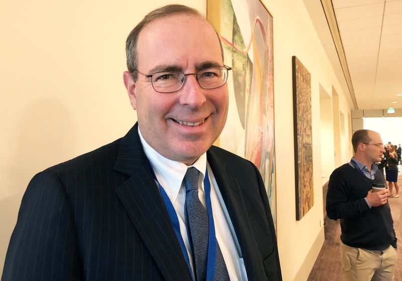 © Reuters. FILE PHOTO: Federal Reserve Bank of Richmond President Thomas Barkin poses during a break at a Dallas Fed conference on technology in Dallas