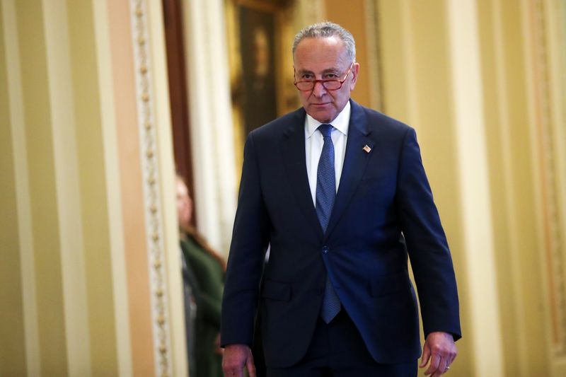 © Reuters. U.S. Senate Minority Leader Schumer  departs the Senate floor after his remarks, in the U.S. Capitol in Washington