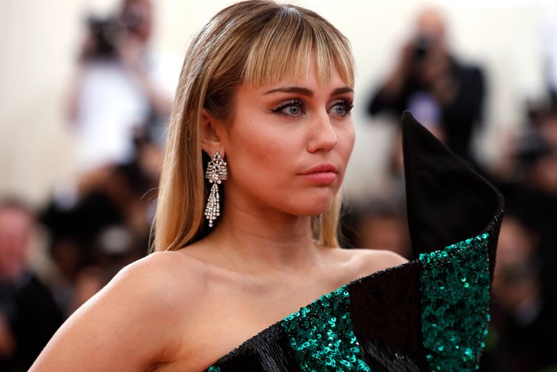 © Reuters. Metropolitan Museum of Art Costume Institute Gala - Met Gala - Camp: Notes on Fashion- Arrivals - New York City, U.S. – May 6, 2019 - Miley Cyrus