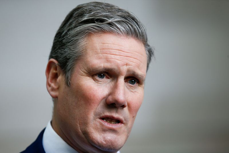 © Reuters. FILE PHOTO: Labour's Keir Starmer speaks to the media as he leaves the BBC Headquarters after appearing on The Andrew Marr show in London, Oct. 20 2019