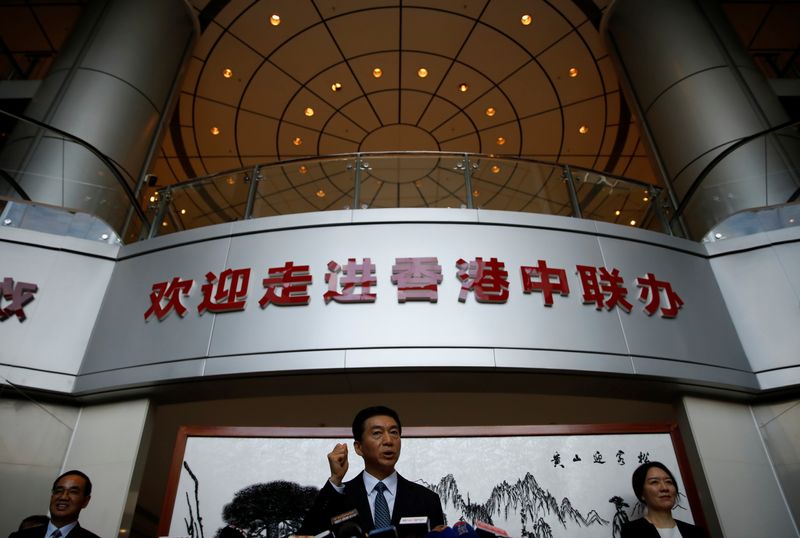 © Reuters. Newly appointed head of Hong Kong Liaison Office Luo Huining speaks to media to mark his first day at office in Hong Kong