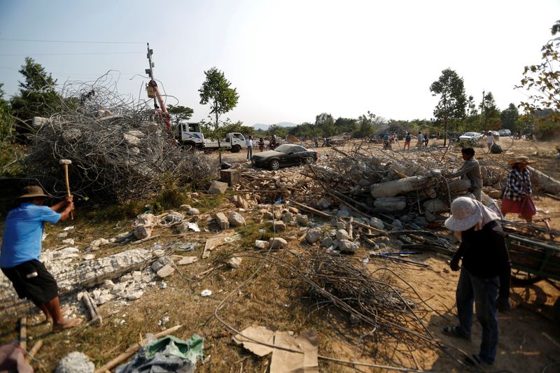 Relaxing workers, children died as Cambodian building crumpled