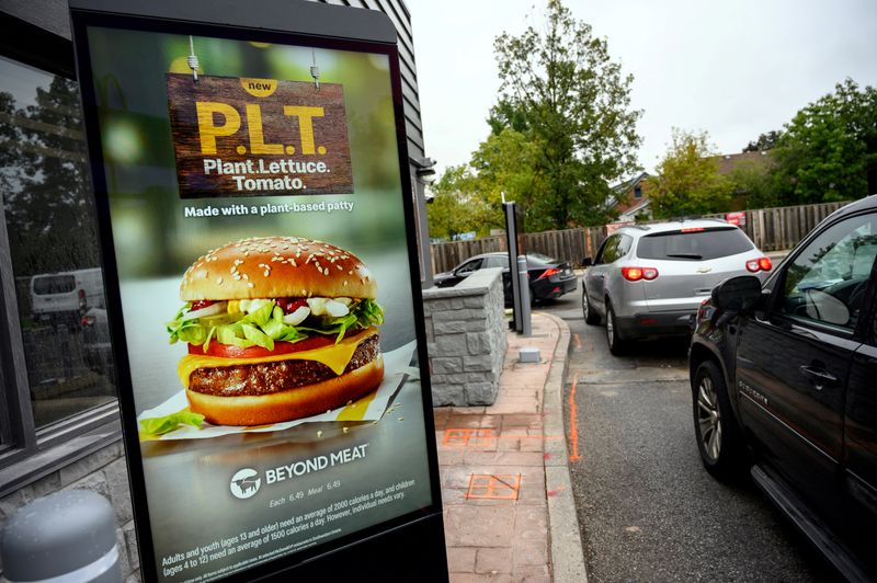 © Reuters. FILE PHOTO: A sign promoting McDonald's 