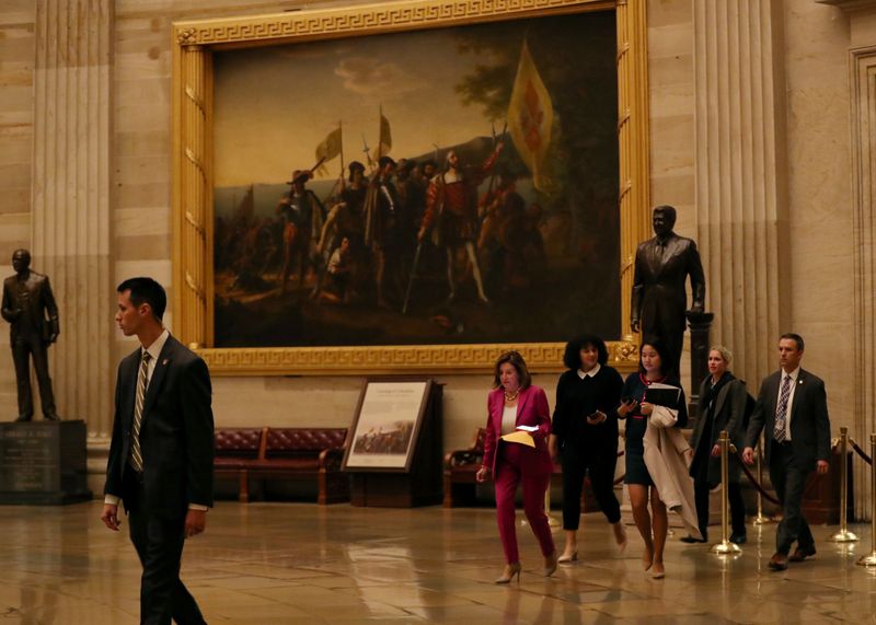 © Reuters. U.S. House Speaker Nancy Pelosi walks to a house democratic leadership meeting on Capitol Hill