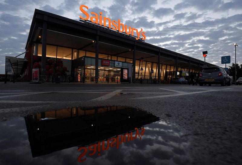 © Reuters. Signage for Sainsbury's is seen at a branch of the supermarket in London
