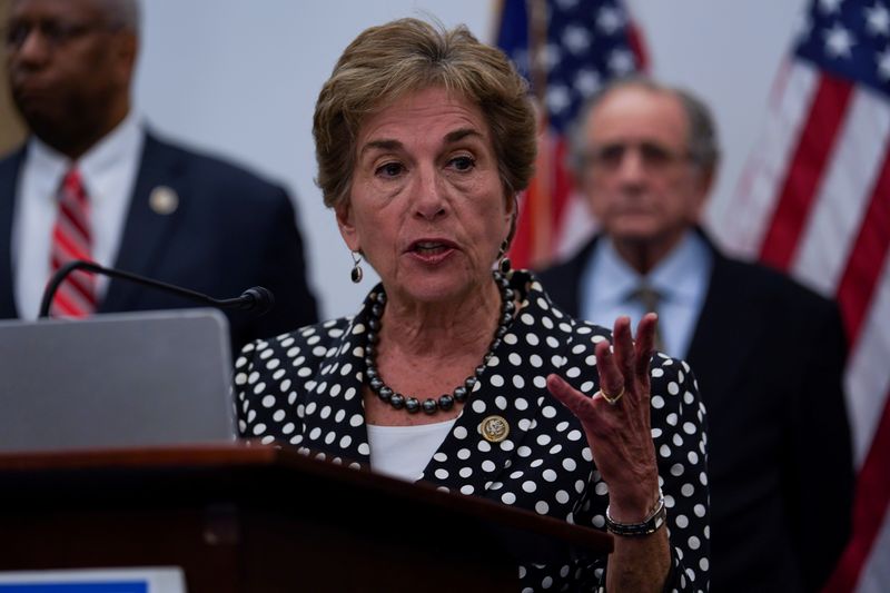 © Reuters. FILE PHOTO: House Democrats hold a news conference on the Trump administration's tax cuts at the U.S. capitol visitors center