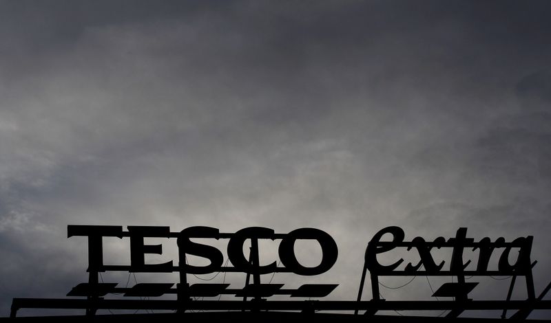 © Reuters. FILE PHOTO: Signage is seen outside a Tesco extra superstore near Manchester
