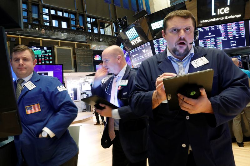 Wall Street notches records on trade optimism, Apple gains