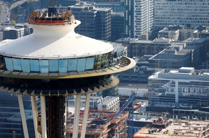 © Reuters. FILE PHOTO: People take in the view from the top of the Space Needle in this aerial photo in Seattle