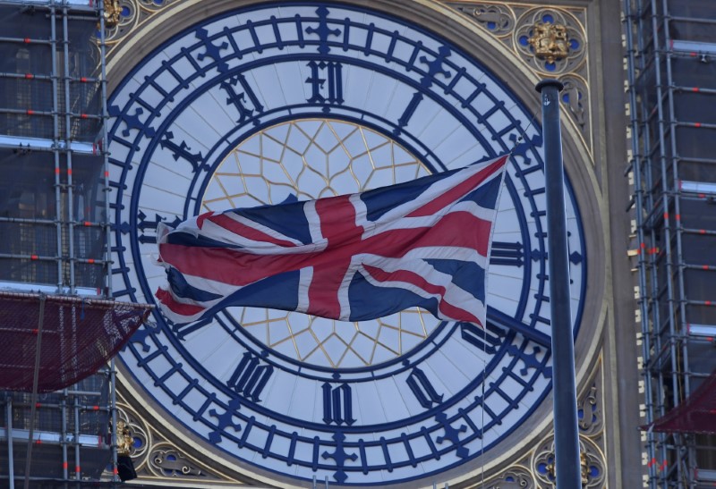 © Reuters. FILE PHOTO: A face of the Big Ben clock tower is seen at The Houses of Parliament in London