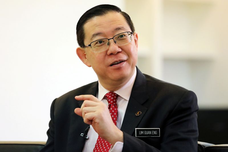© Reuters. FILE PHOTO: Malaysia's Finance Minister Lim Guan Eng speaks during an interview with Reuters in Putrajaya