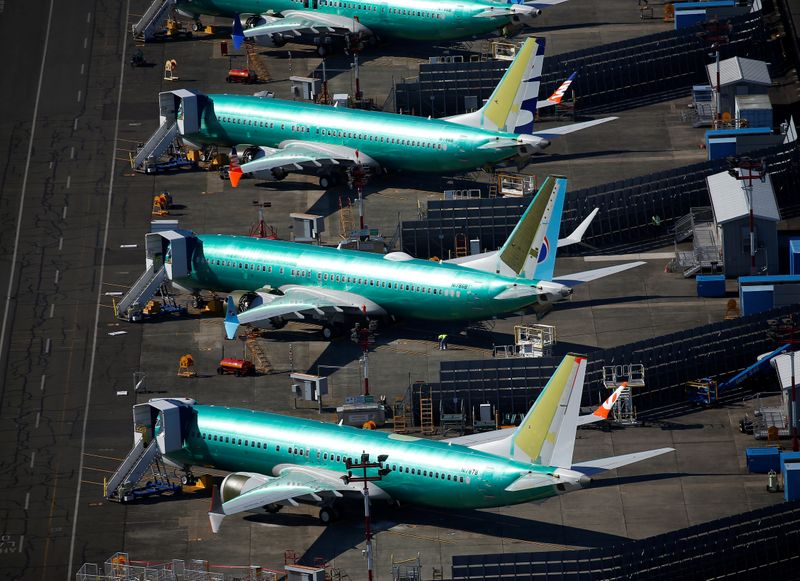 © Reuters. Unpainted Boeing 737 MAX aircraft are seen parked at Renton Municipal Airport in Renton