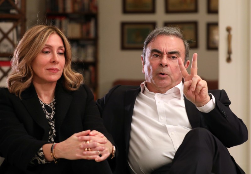 © Reuters. Former Nissan chairman Carlos Ghosn and his wife Carole Ghosn talk during an interview with Reuters in Beirut