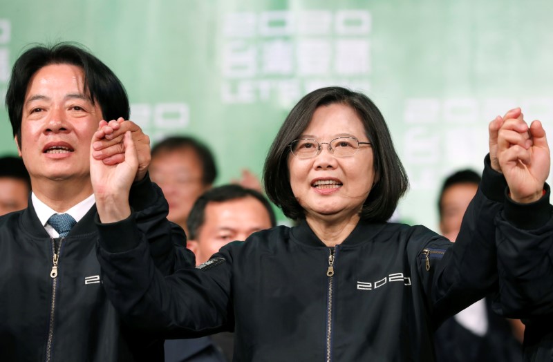 Taiwan president urges China to review policy after election win