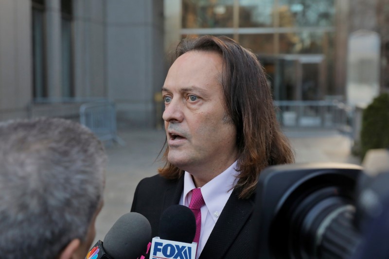 © Reuters. T-Mobile US Inc CEO John Legere departs a hearing at Manhattan Federal Court in New York City
