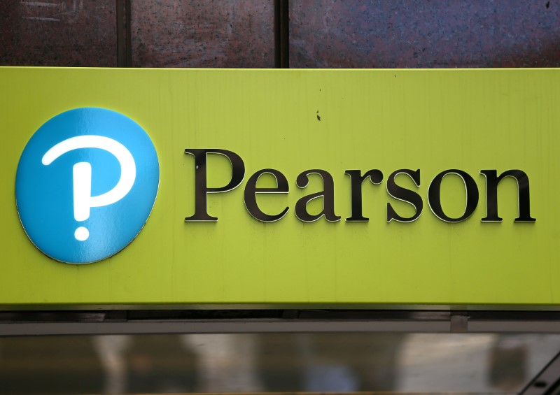 © Reuters. FILE PHOTO: The company logo is displayed outside the Pearson offices in London