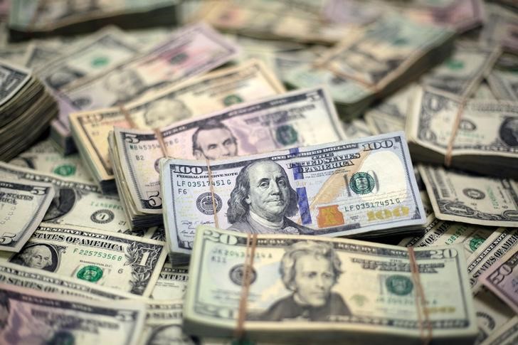 Dollar stands tall on stronger U.S. data, hits fresh 8 month-high vs yen
