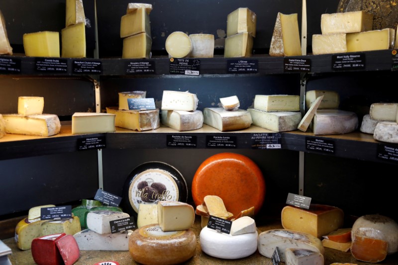 © Reuters. FILE PHOTO: Pieces of cheese are seen inside Beaufils cheesemonger in Paris