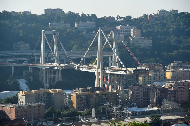 © Reuters. FILE PHOTO: General view of Morandi Bridge, before controlled explosions will demolish two of its pylons almost one year since a section of the viaduct collapsed killing 43 people, in Genoa