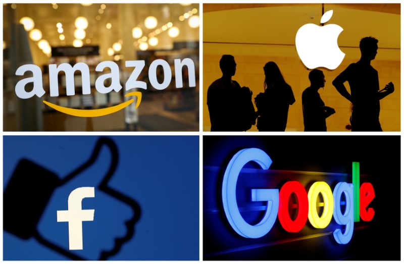 © Reuters. FILE PHOTO: The logos of Amazon Apple Facebook and Google