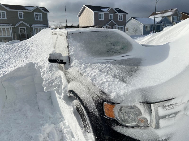 © Reuters. Pile of snow is pictured outside a house in St John's