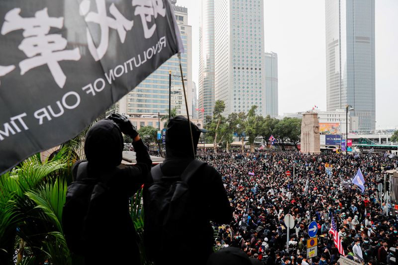 © Reuters. Anti-government protesters attend a rally to call for democratic reforms in Hong Kong