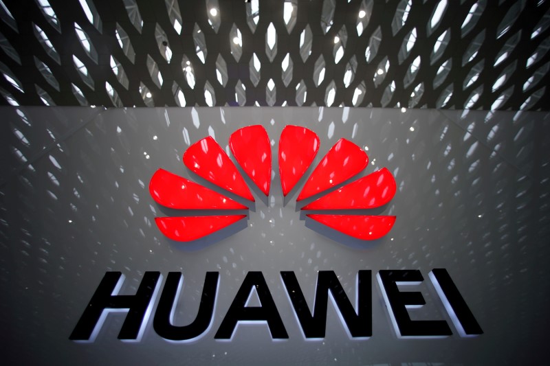 © Reuters. FILE PHOTO: A Huawei company logo at Shenzhen International Airport