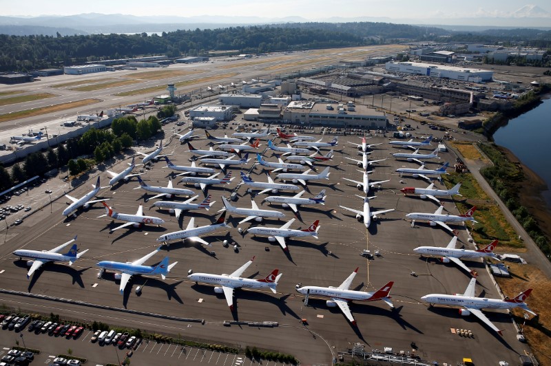 © Reuters. FILE PHOTO: Grounded Boeing 737 MAX aircraft are seen parked at Boeing Field in Seattle