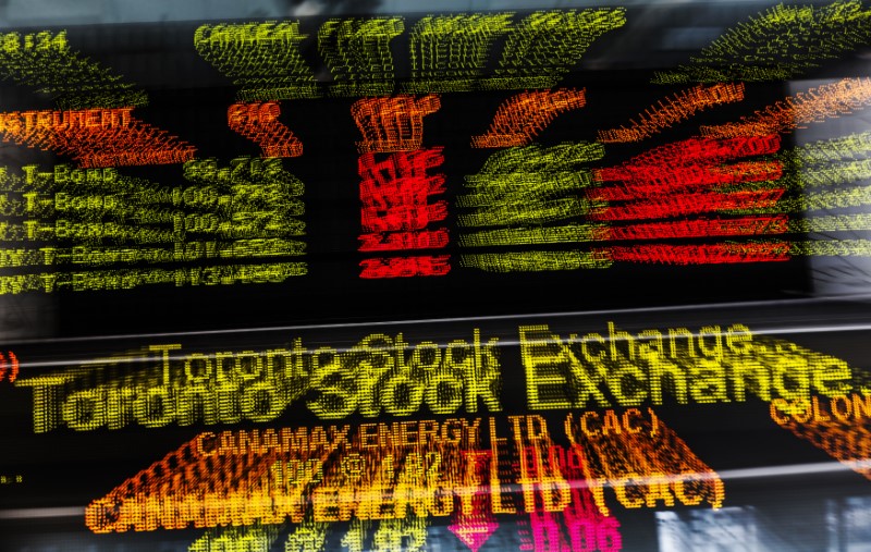 © Reuters. A sign board displaying Toronto Stock Exchange stock information is seen in Toronto