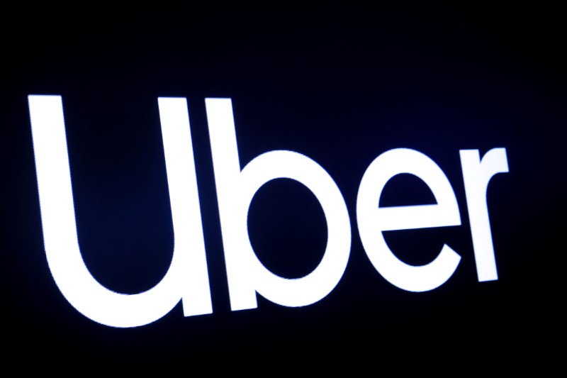 © Reuters. FILE PHOTO:  A screen displays the company logo for Uber Technologies Inc. on the day of it's IPO at the NYSE in New York