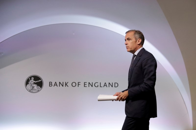 © Reuters. FILE PHOTO: Mark Carney the Governor of the Bank of England attends a Financial Stability Report news conference at the Bank of England in the City of London