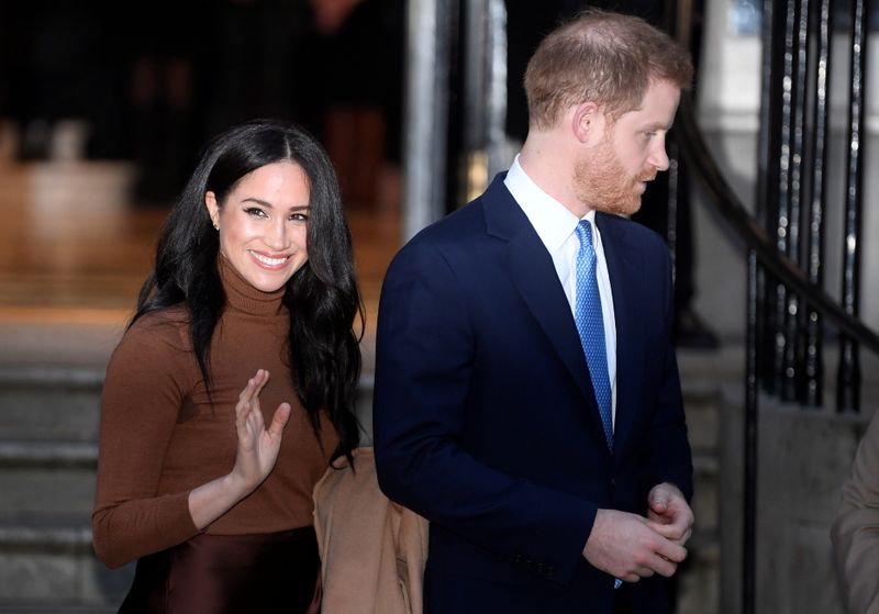 © Reuters. FILE PHOTO: Britain's Prince Harry and his wife Meghan, Duchess of Sussex, leave Canada House in London