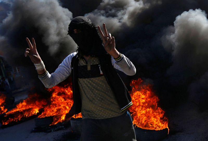 © Reuters. مقتل محتجين اثنين في الناصرية بجنوب العراق
