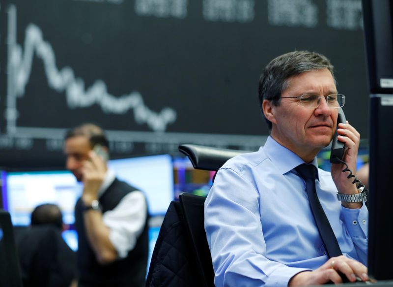 © Reuters. FILE PHOTO:  A trader works at Frankfurt's stock exchange in Frankfurt