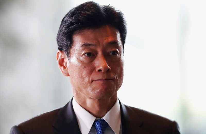 © Reuters. 新型ウイルス、訪日客の3割占める中国人への影響注視＝西村再生相